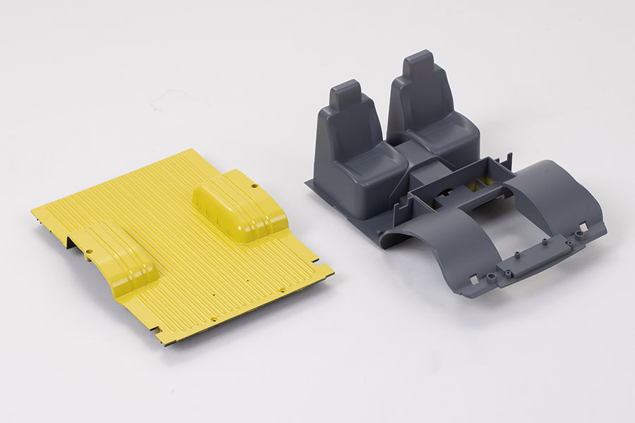 1:18 Hilux chassis parts including yellow floor and gray seats