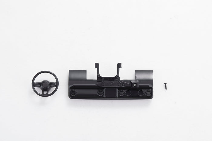 1:18 scale model car dashboard with steering wheel and accessory screw