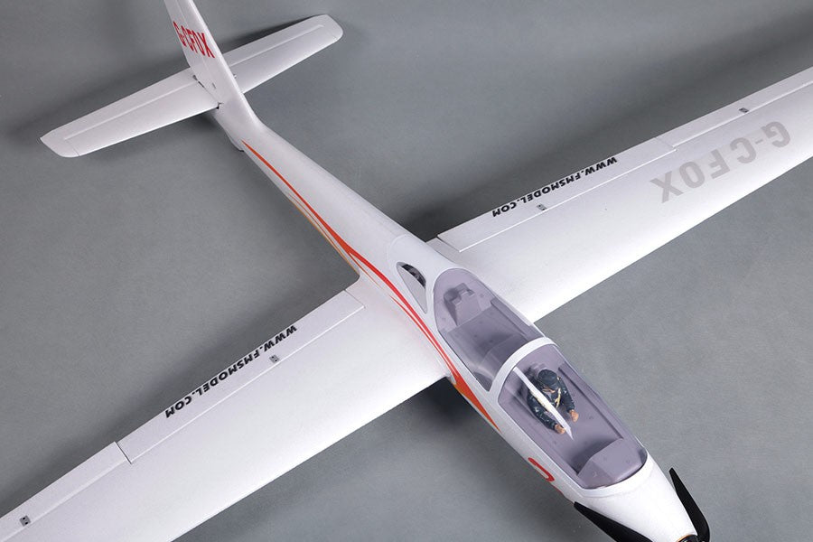 FMS 2300mm FOX V2 Glider PNP features a white EPO foam body with orange racing stripes and G-CFox markings.