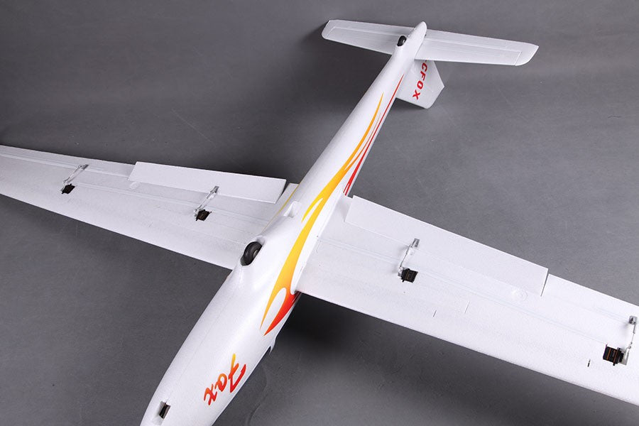 FMS 2300mm FOX V2 Glider PNP: white EPO foam, flame graphics, 'FOX' branding. Large wingspan, tail detail.