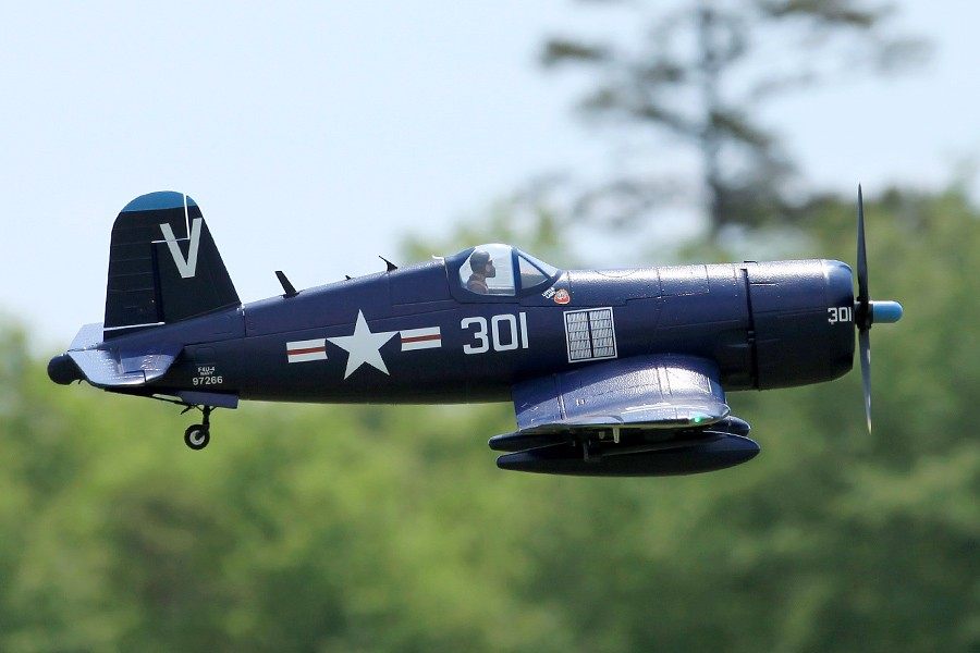 FMS 1400mm blue F4U Corsair RC airplane in flight with '301' and star insignia