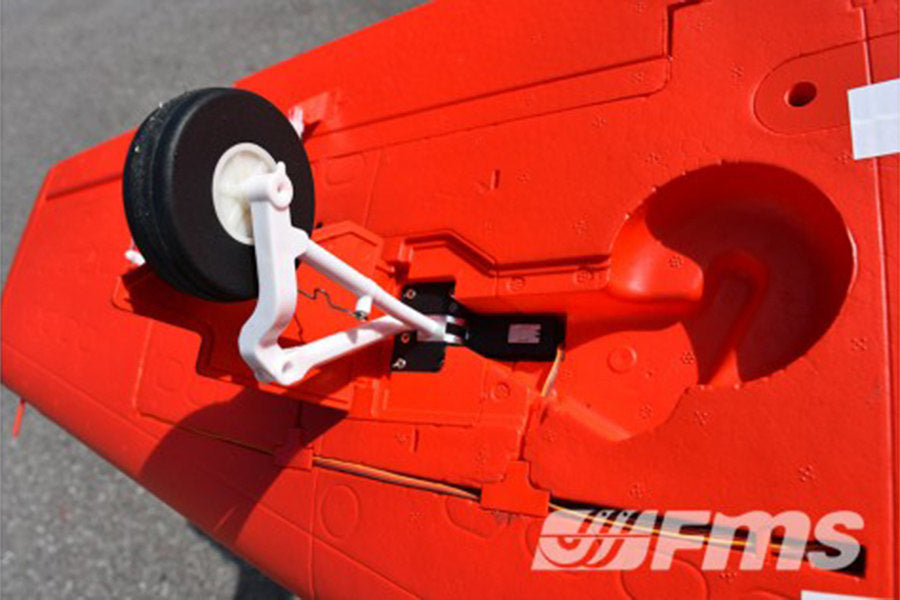 FMS 1100mm PC-21 Pilatus PNP RC airplane underside with retractable landing gear and FMS logo.